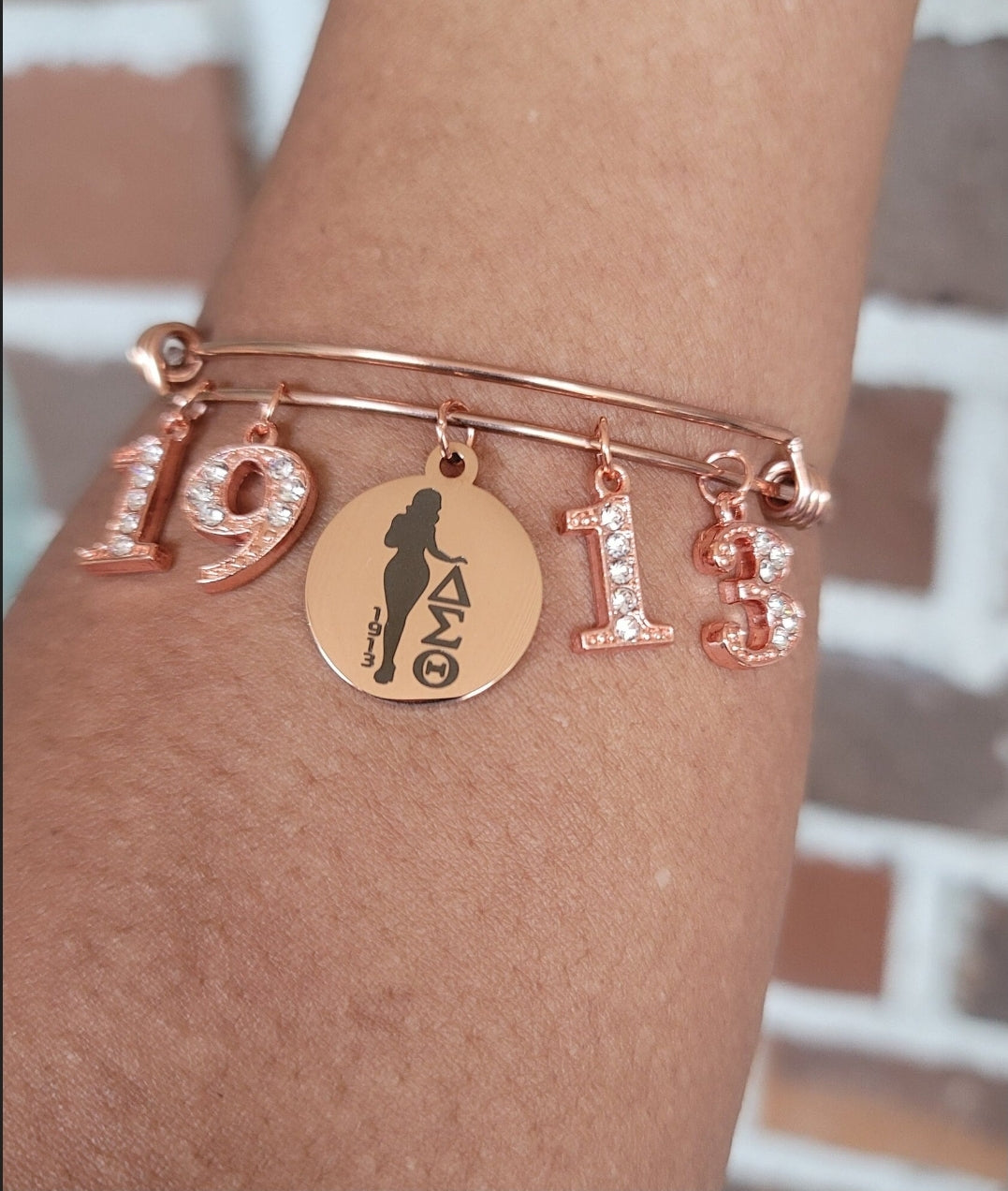 Delta Charm Bracelet Available in Rose Gold and Silver