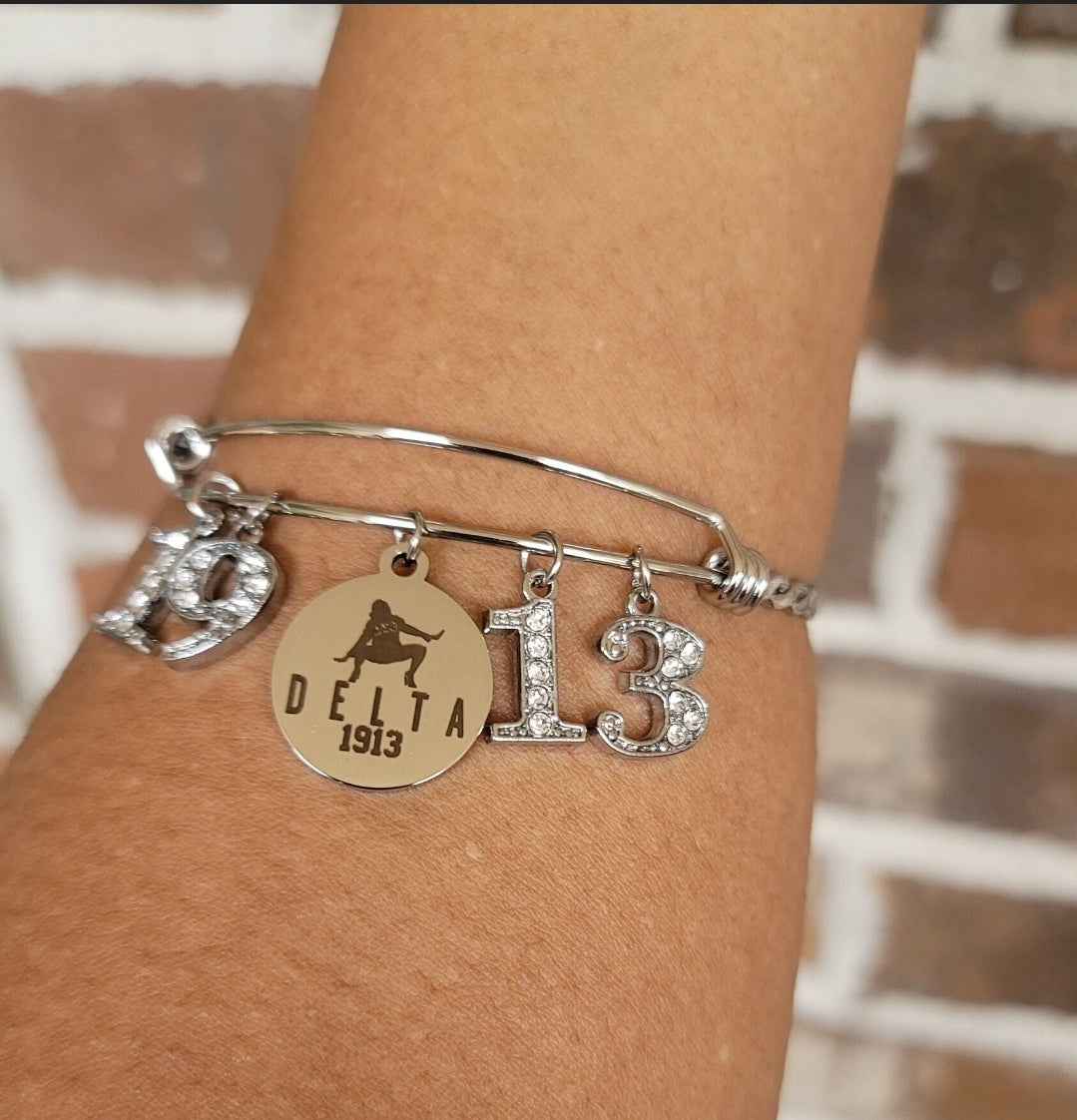 Delta Charm Bracelet Available in Rose Gold and Silver