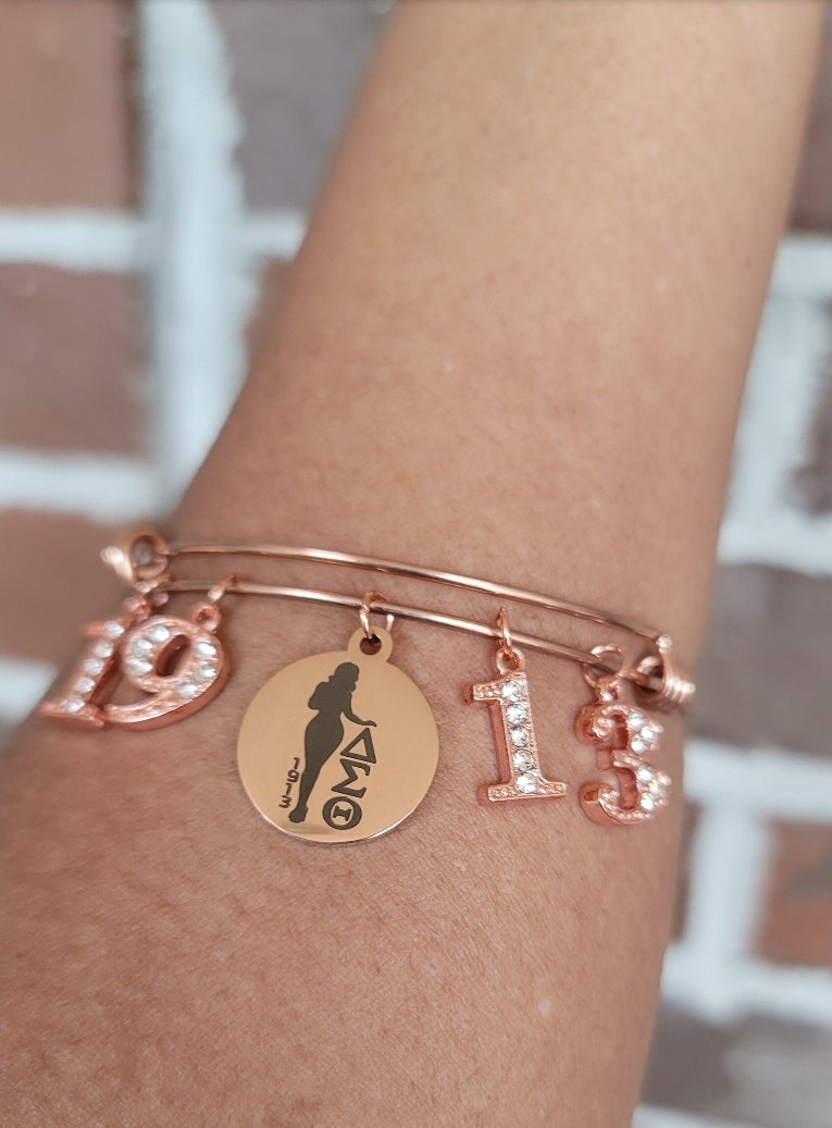 Delta Charm Bracelet Available in Rose Gold and Silver