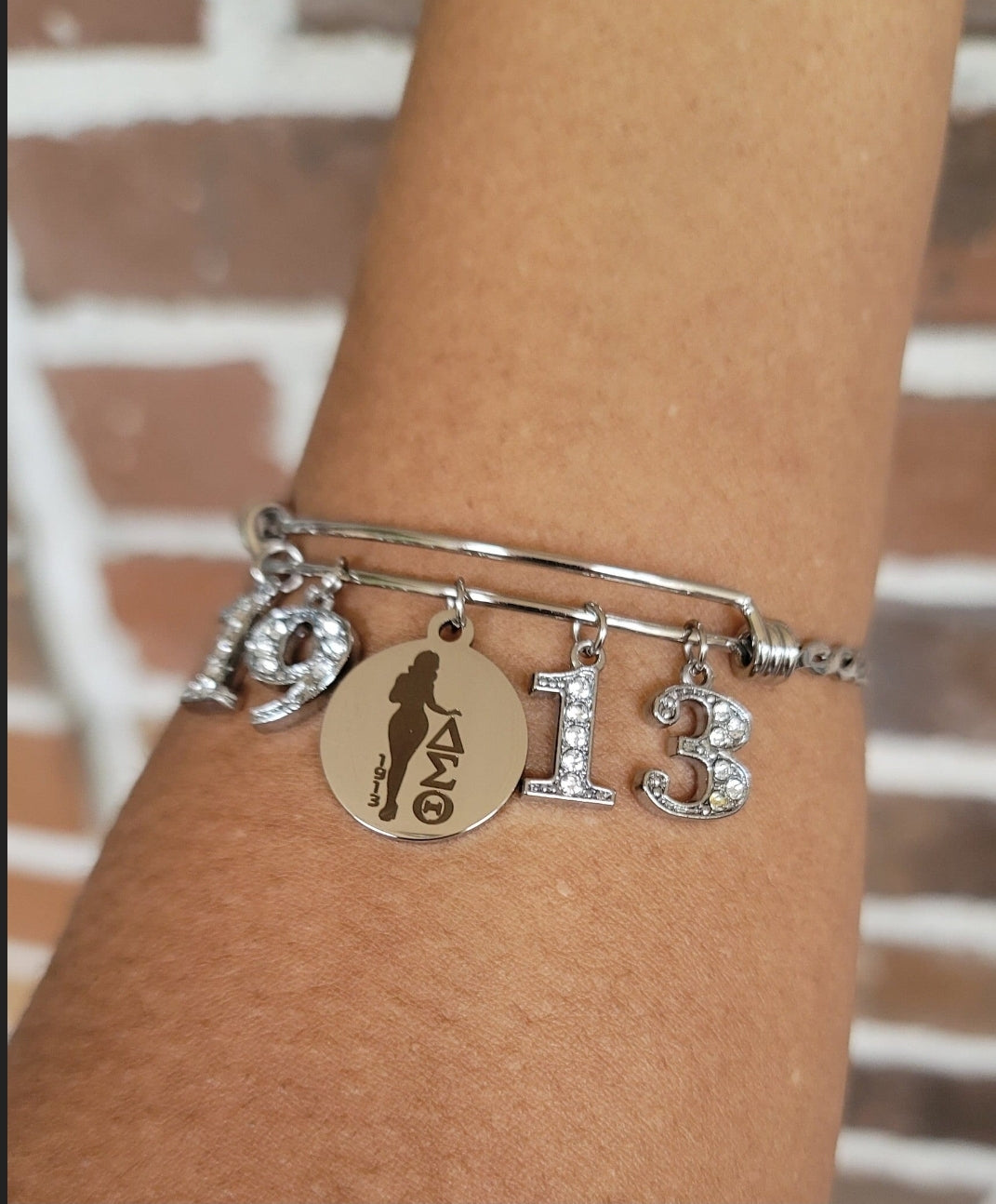Delta Charm Bracelet Available in Rose Gold and Silver