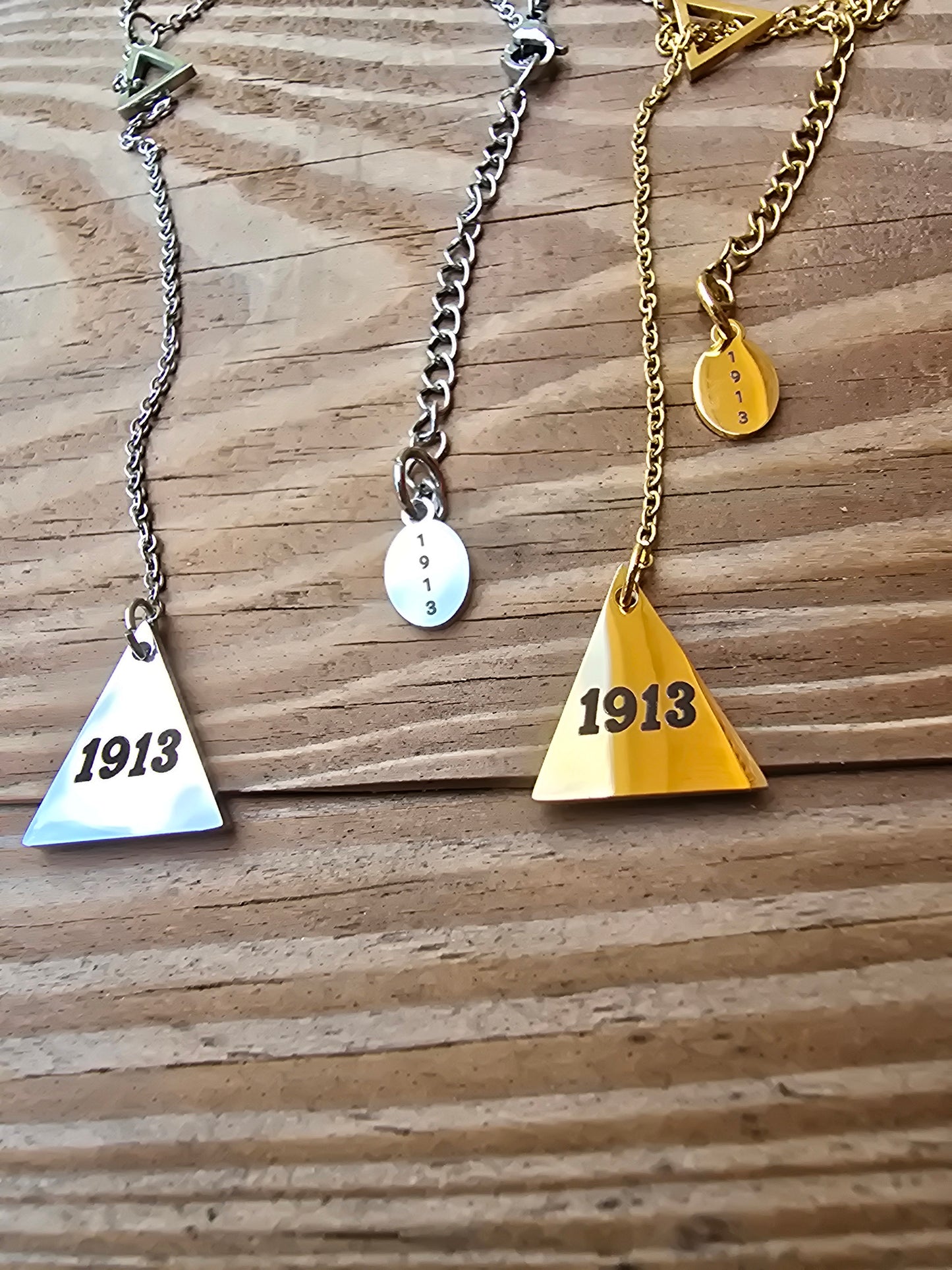 Pyramid 1913 Delta Sigma Theta Sorority Dangling necklaces available in gold & silver