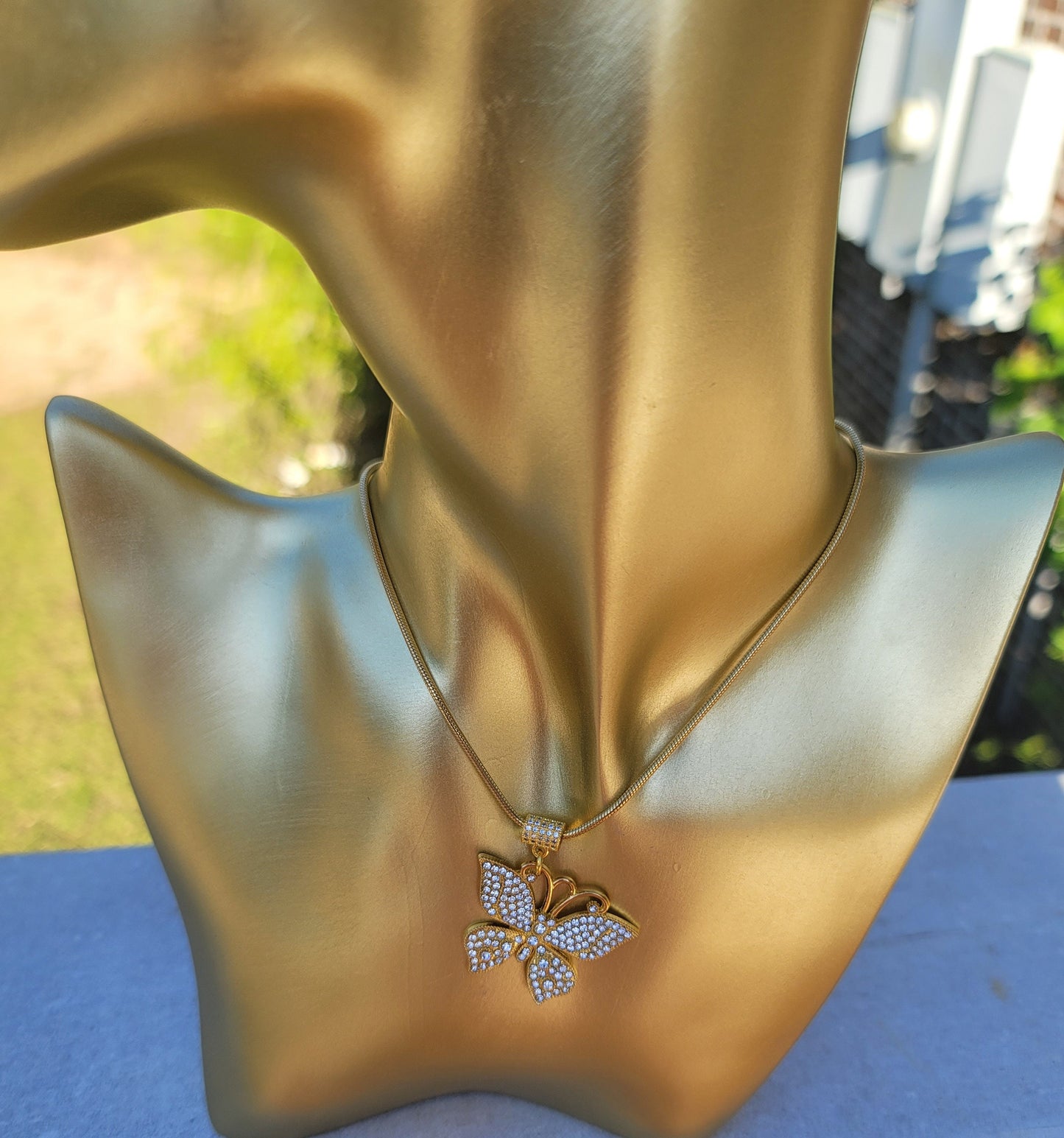 Butterfly necklace available in silver and gold