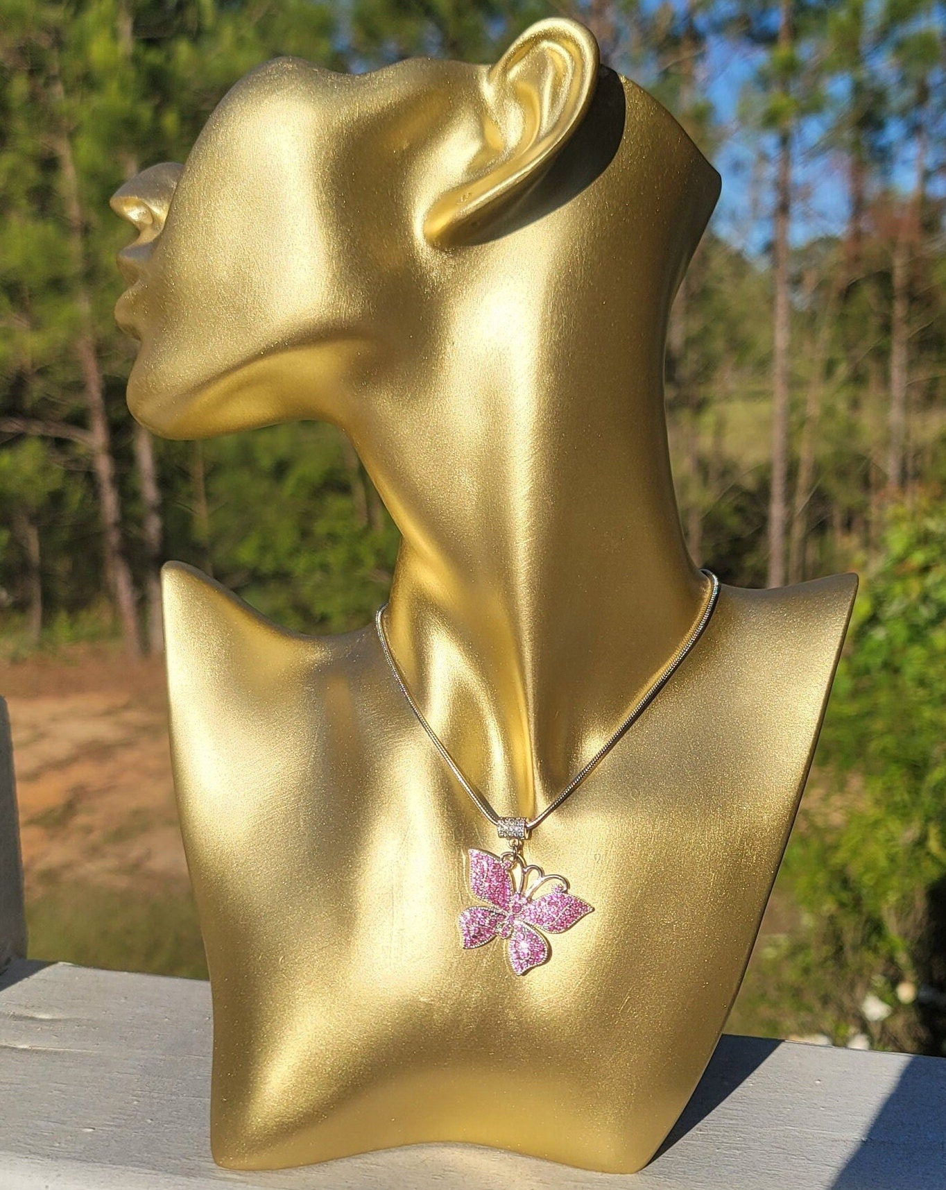 Butterfly necklace available in silver and gold