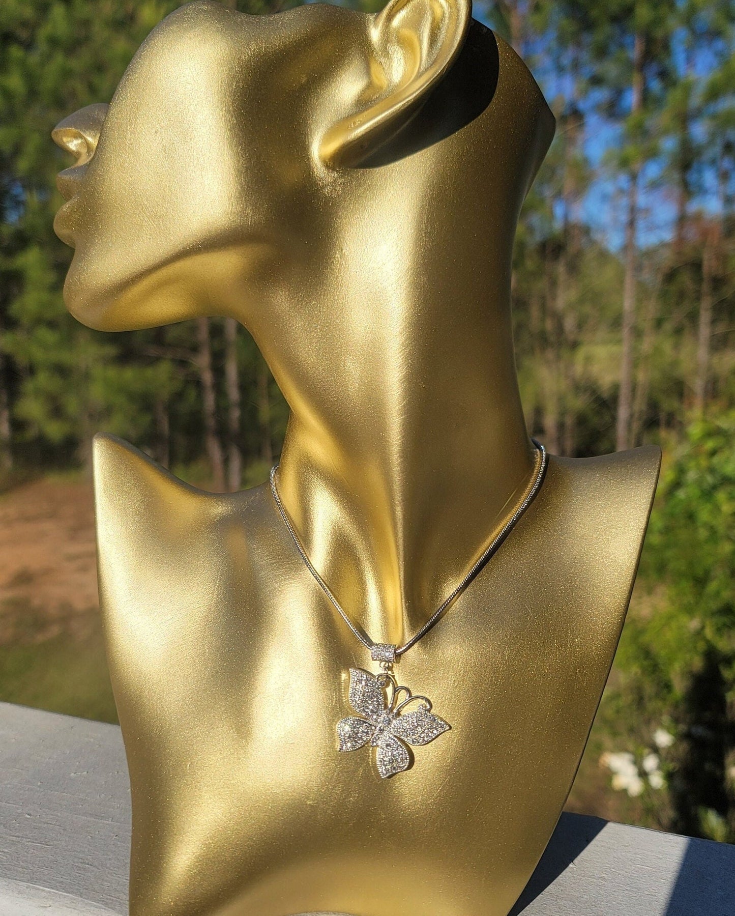 Butterfly necklace available in silver and gold