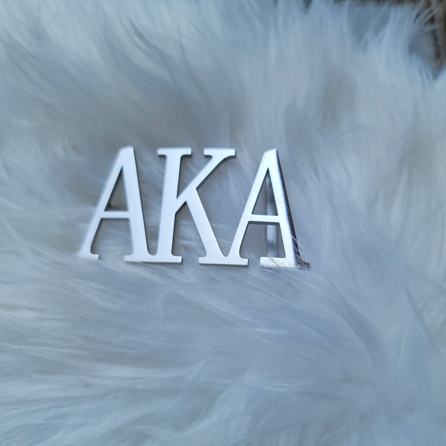 Sorority Greek letter belt   Made from quality material, the buckle will not tarnish nor fade  Material: stainless steel (with belt buckle only, belt not included) height 1.575 inches, width 3 inches.  The weight of the buckle is approximately 12 ounces.  NOTE: Belt used for display purposes only, not included with the purchase of the buckle.