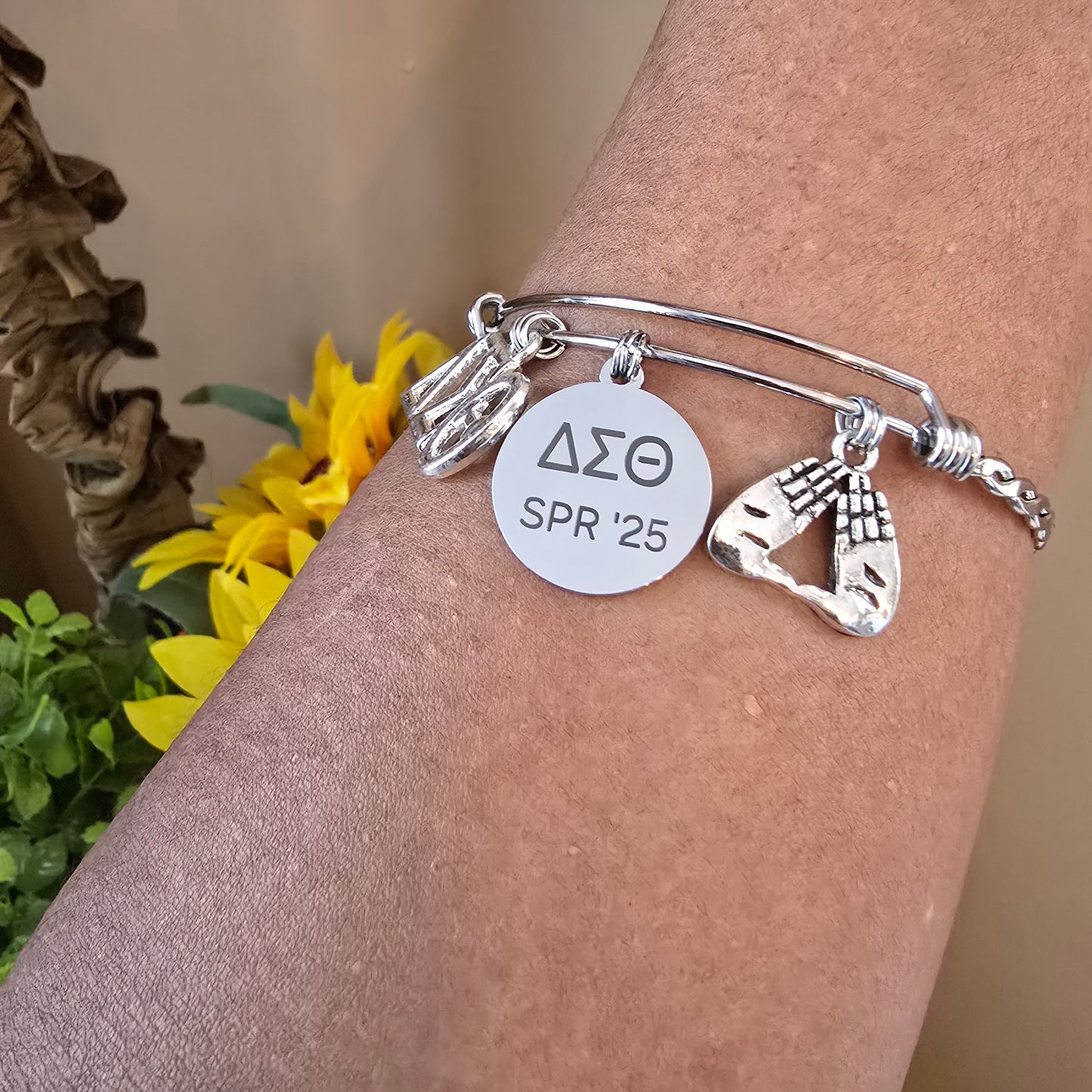 Delta Sigma Theta Spring 2025 Charm Bracelet Available in Gold and Silver