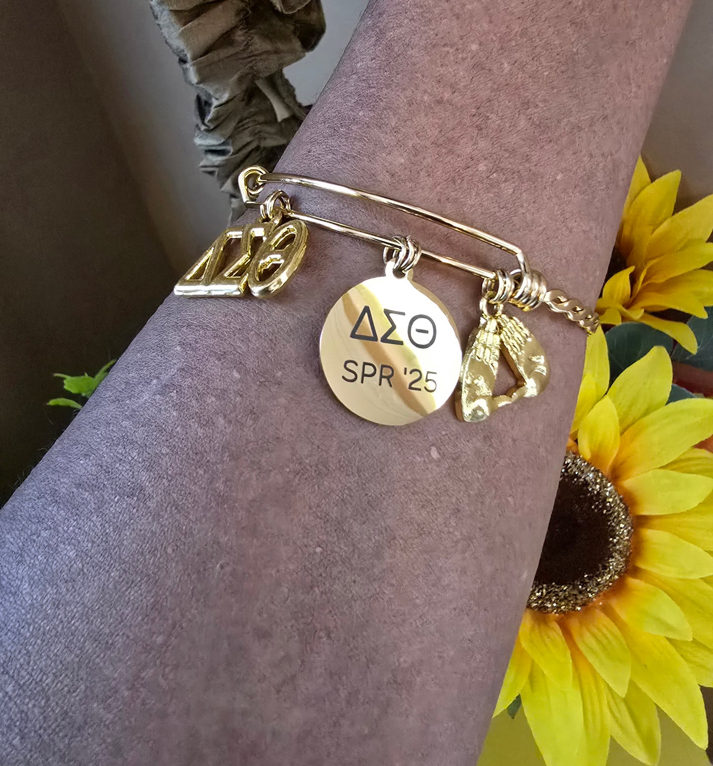Delta Sigma Theta Spring 2025 Charm Bracelet Available in Gold and Silver