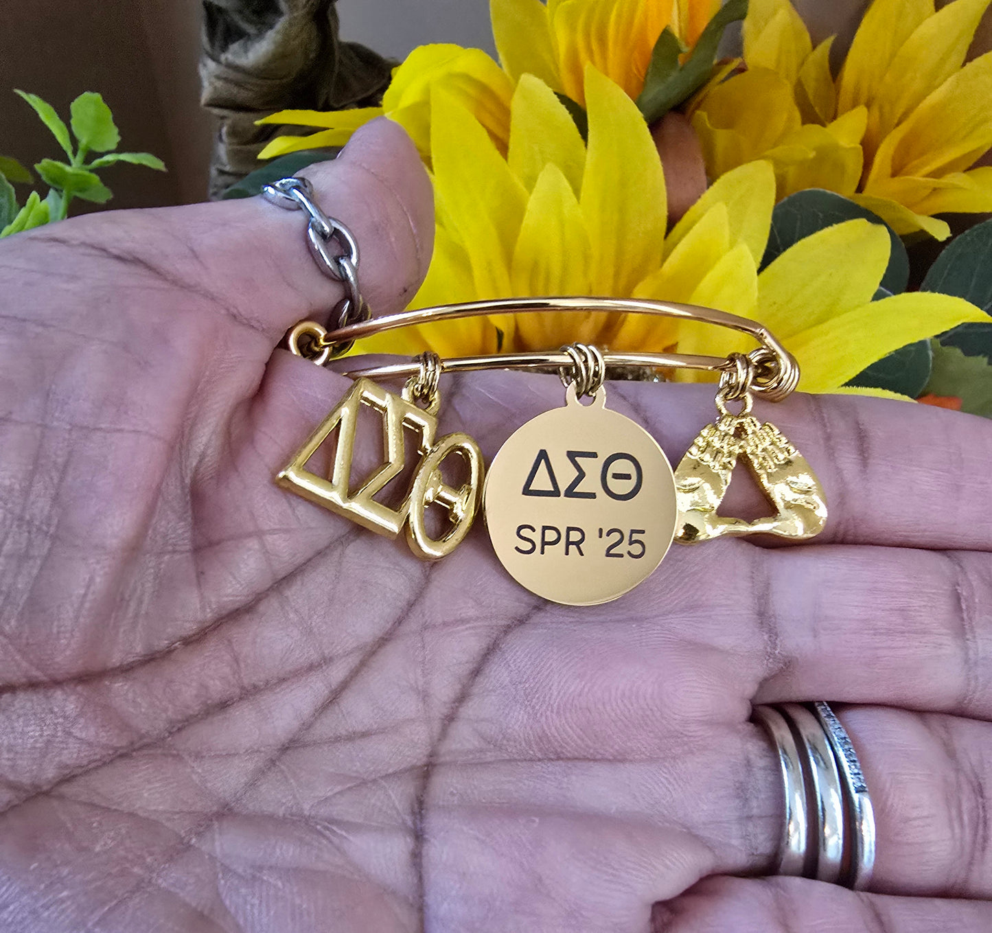 Delta Sigma Theta Spring 2025 Charm Bracelet Available in Gold and Silver