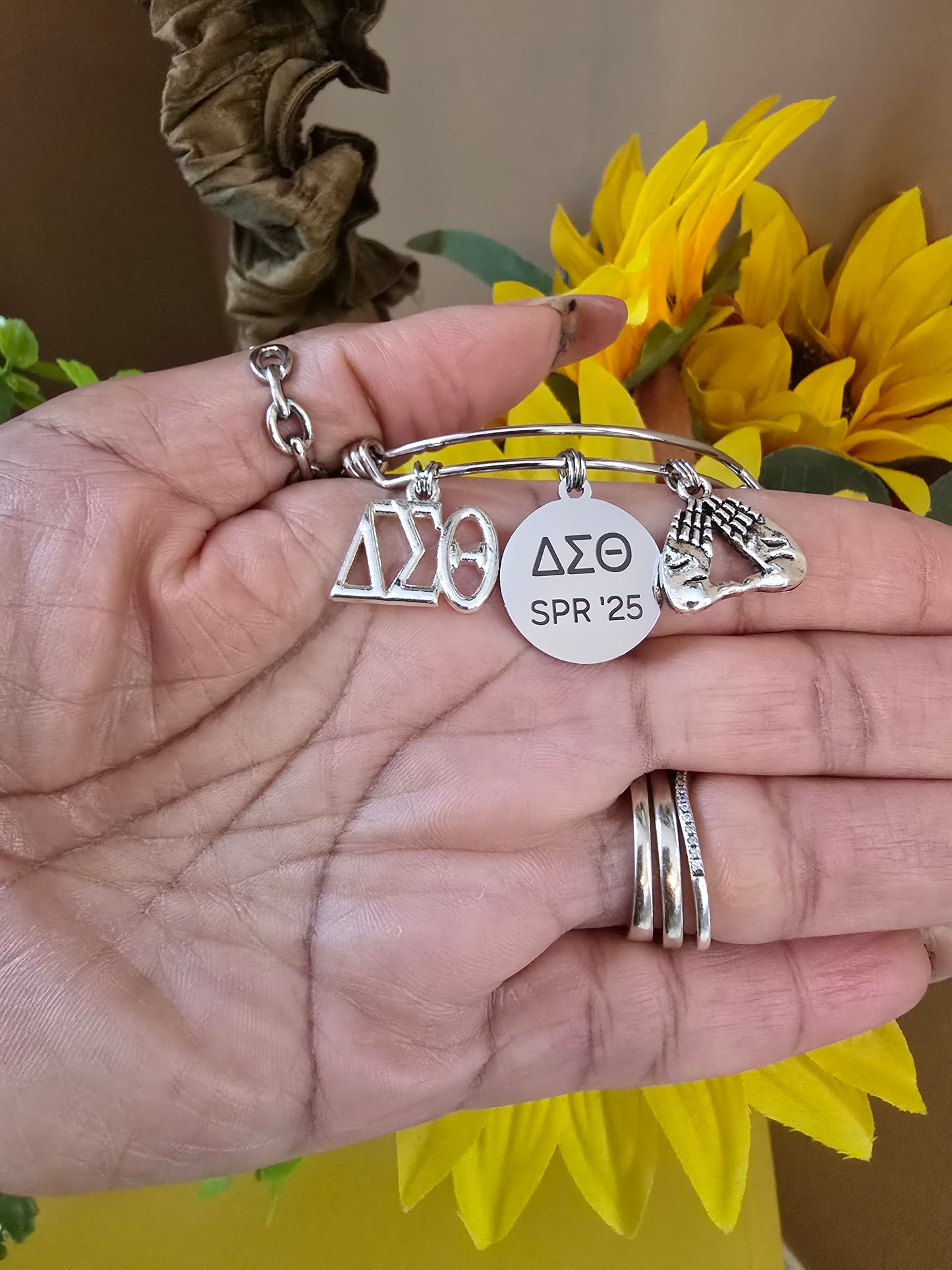 Delta Sigma Theta Spring 2025 Charm Bracelet Available in Gold and Silver