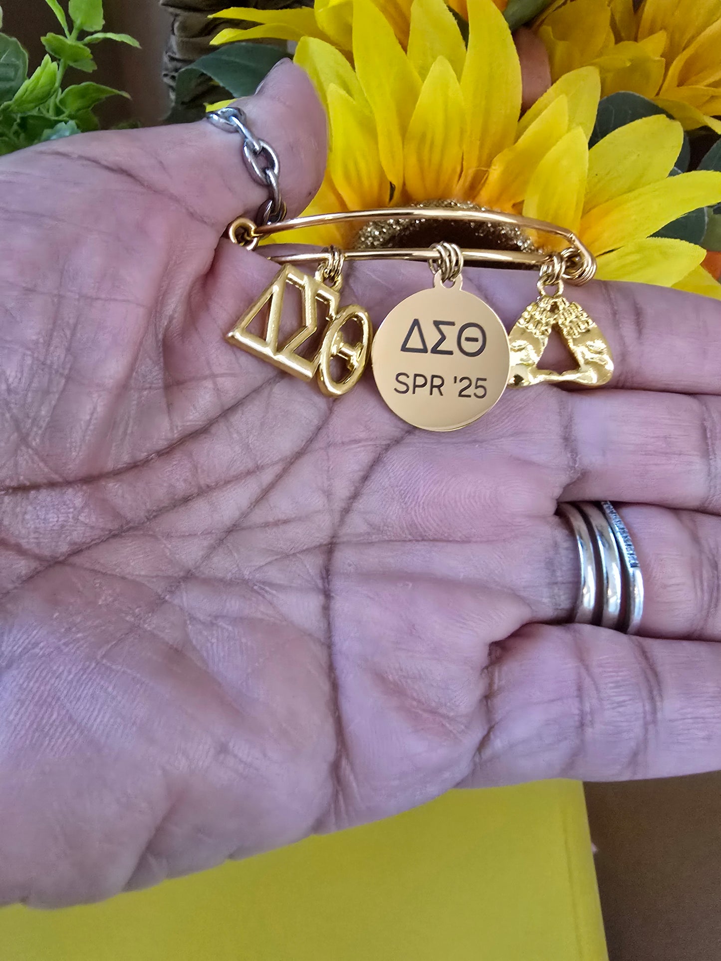 Delta Sigma Theta Spring 2025 Charm Bracelet Available in Gold and Silver