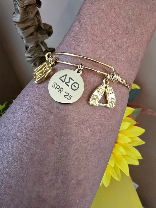 Delta Sigma Theta Spring 2025 Charm Bracelet Available in Gold and Silver
