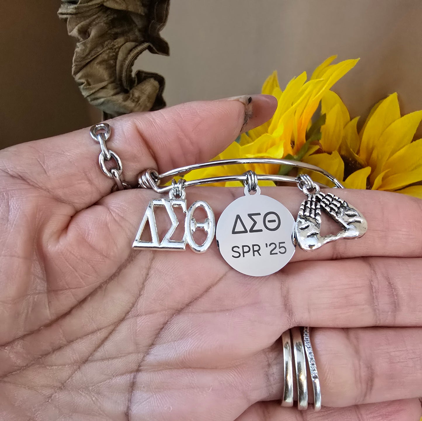 Delta Sigma Theta Spring 2025 Charm Bracelet Available in Gold and Silver