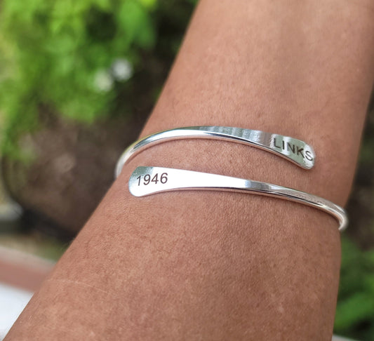 The LINKS 1946, Inc. Adjustable Cuff Bracelet Available in Silver & Gold